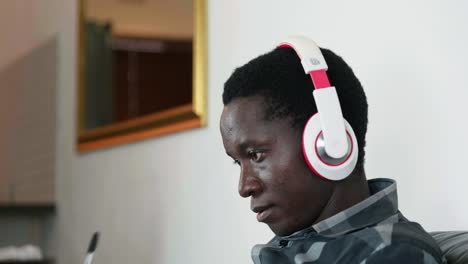 african man with head  phones while working zoom call