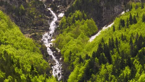 waterfalls cascading down steep mountainside