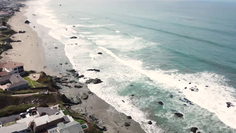 properties on the coast with morro rock in the distance