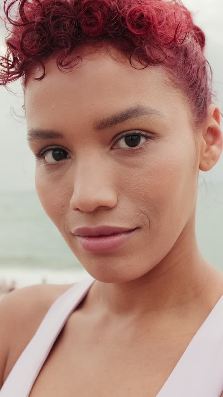 Confident Woman in Sportswear at the Beach