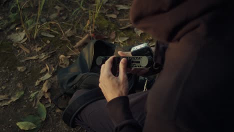 photographer setting up camera outdoors