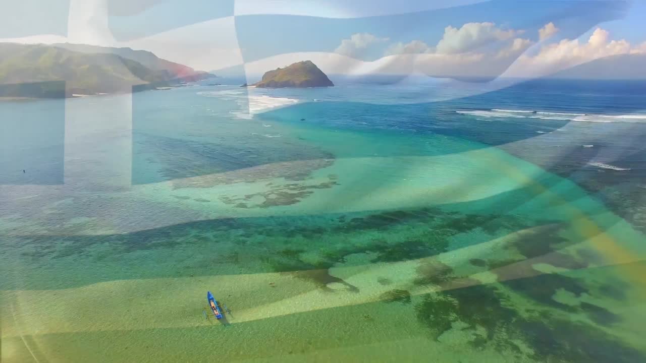 composición digital de agitar la bandera de grecia contra la vista aérea del mar