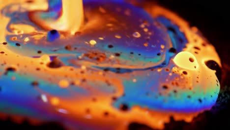 a vibrant display of fluid dynamics: mesmerizing swirls, colors, and textures in a viscous liquid composition captured over time