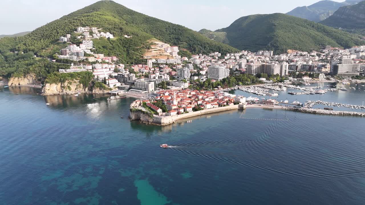 Aerial drone birds eye view budva Riviera old town city coastal montenegro balkan country balkans adriatic sea coastline Stari Grad sveti nikola island