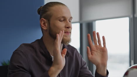 annoyed man screaming video call at home portrait. angry manager gesturing hands