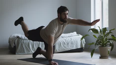 man doing exercise at home