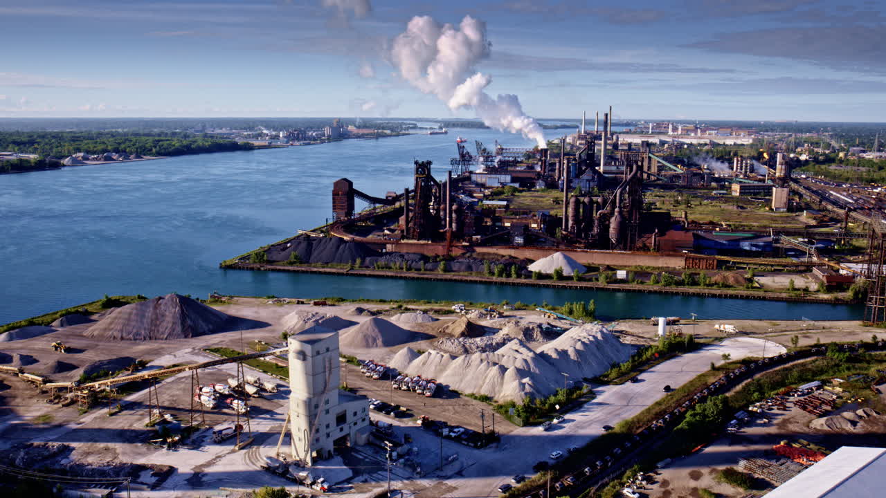 Smooth cinematic drone flight encircling the international bridge across the border