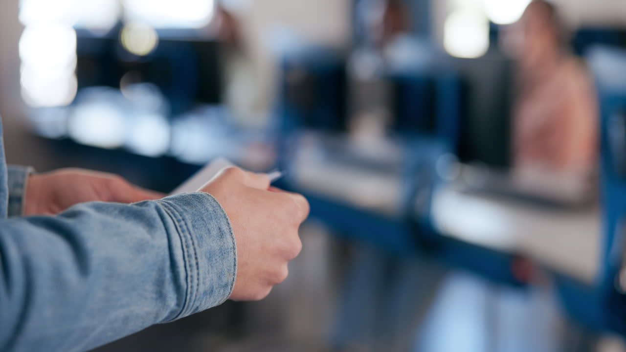 Hand in a computer lab