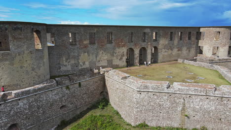 Tourist-destination---Old-Borgholm-Castle,-Borgholm,-Öland,-Sweden---Aerial