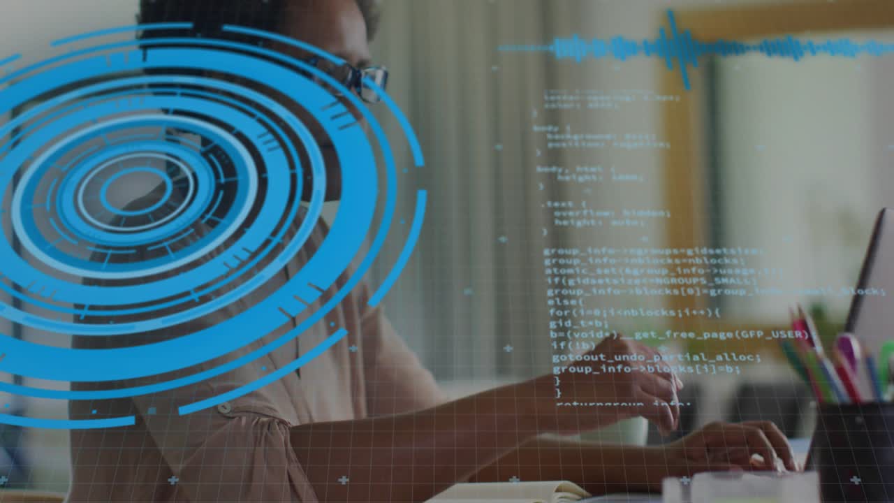 Programmer typing on laptop activating HUD graphic and code overlay fixing glasses before typing