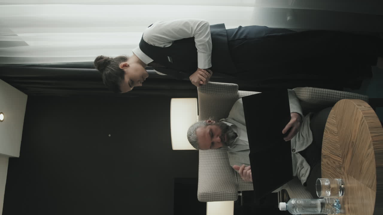 Adult Man Ordering Dinner in Hotel Room