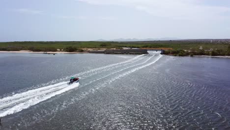 Boat-enters-El-Morro-National-Park,-Montecristi