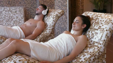 couple relaxing in thermal suite