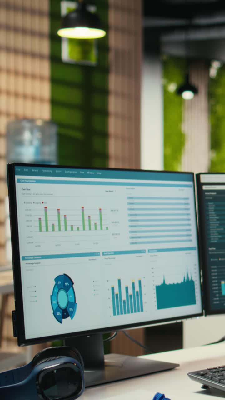 Vertical Video Empty workspace in a multinational company showcases computers