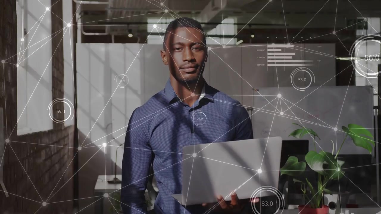 Male tech pro holding laptop in loft, animated HUD appearing and guiding laptop lowering for demo