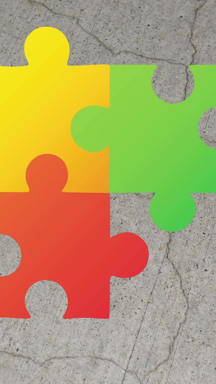 Animazione di pezzi di puzzle colorati, testo del mese della consapevolezza sull'autismo