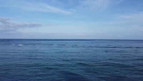 Vast Blue Ocean and Sky with Gentle Waves