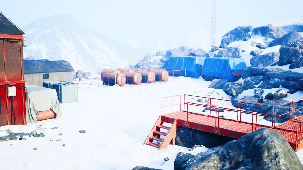 Winter expedition base located in a snowy mountainous region with storage tanks