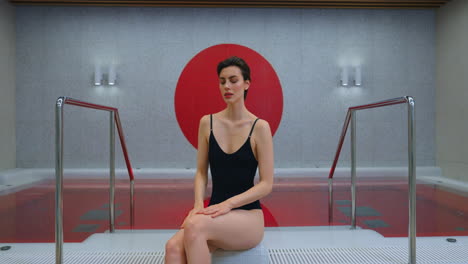 woman relaxing in a modern spa pool