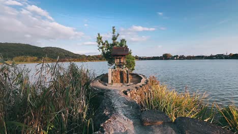 japanese shrine by a lake