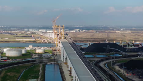 aerial view away from the construction of the beltway 8 bridge, sunset in houston