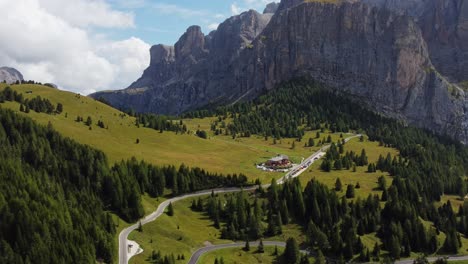 tilt down drone shot of the great dolomites road in italy