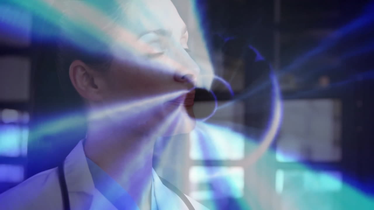 In school, doctor studying animation of futuristic blue light pattern in classroom