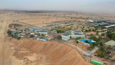 high aerial view of kibbutz yotvata, southern arava, israel showing modern buildings