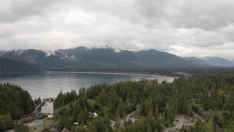 drone shot to reveal the town of port renfrew, british columbia