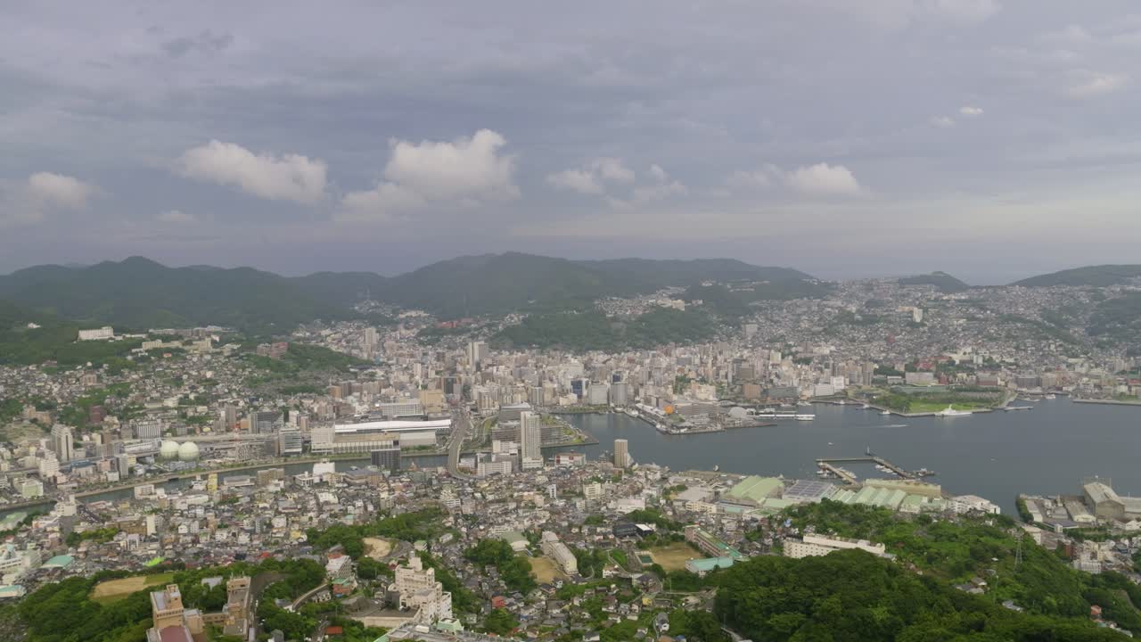 Beautiful sunset panorama over Nagasaki city from high above viewpoint