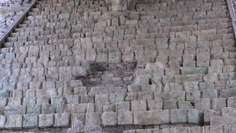 tilt up hieroglyphic stairway at ancient copan mayan ruin in honduras