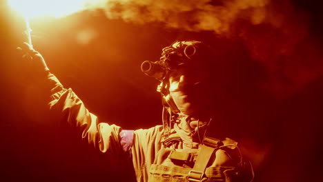 soldier with flare at night