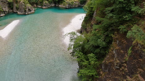 aerial-shot-touring-the-narrowing-of-Lake-Komani-and-its-mountains