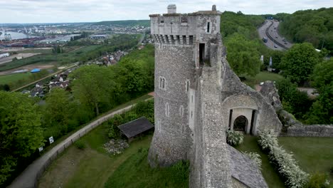 aerial view of castle tower in normandy france with freeway behind