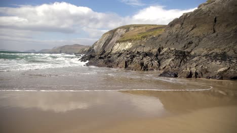 left pan of coumeenoole beach in dingle peninsula, ireland