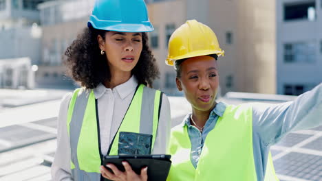 tablet, solar panels and engineering women
