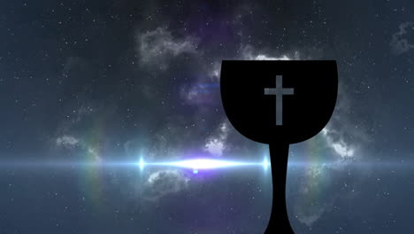 chalice with cross silhouette against starry cosmic animation in background