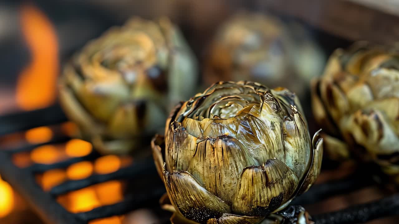 Delicious artichokes grilling on a barbecue, surrounded by flames, creating a smoky and flavorful dish perfect for summer gatherings and outdoor meals