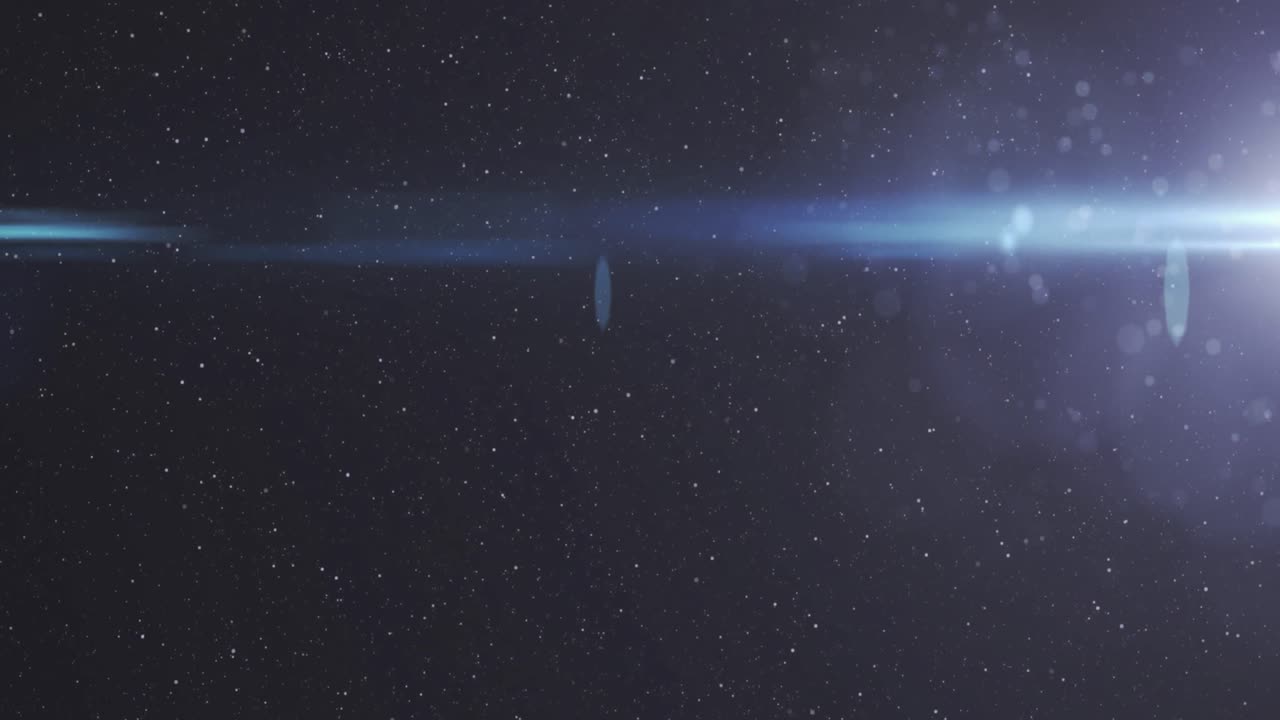 검은 바탕에 있는 빛의 흔적과 반점의 애니메이션