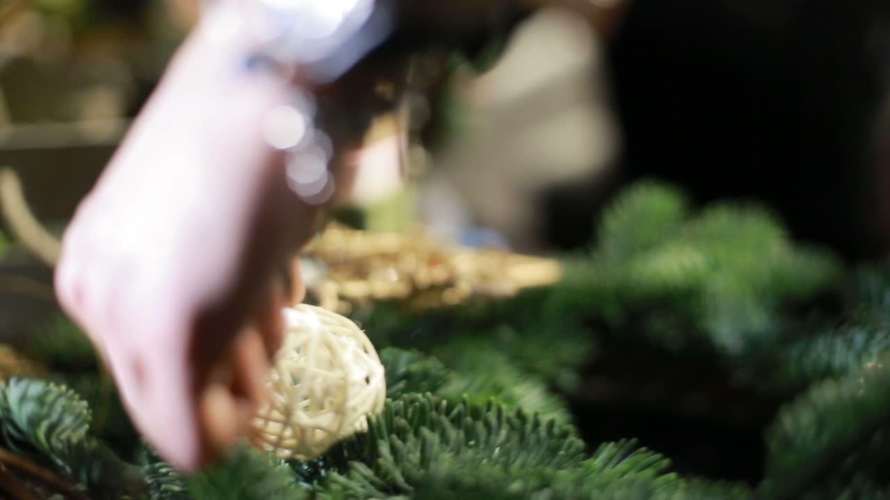 Christmas Tree Toys Handmade. Young girl making by hands x-mas decorations