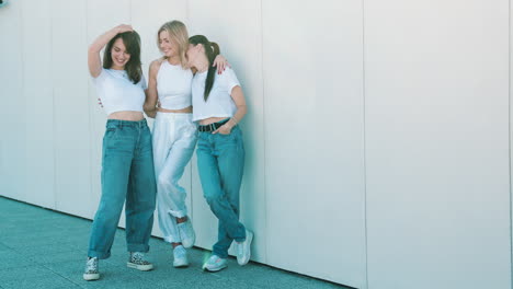 three friends laughing outside