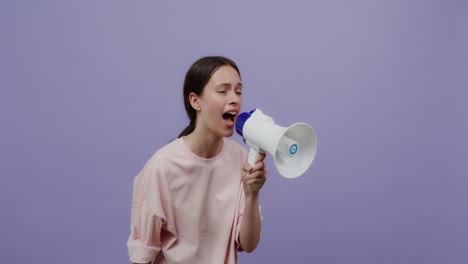 teenager speaking through megaphone