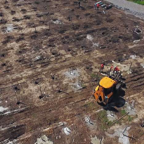 excavator working on field