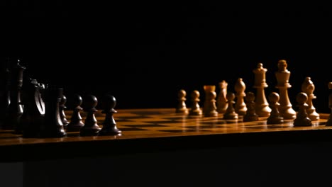 cinematic shot of chess pieces on a chessboard, the background is black, and the light source is coming from the right