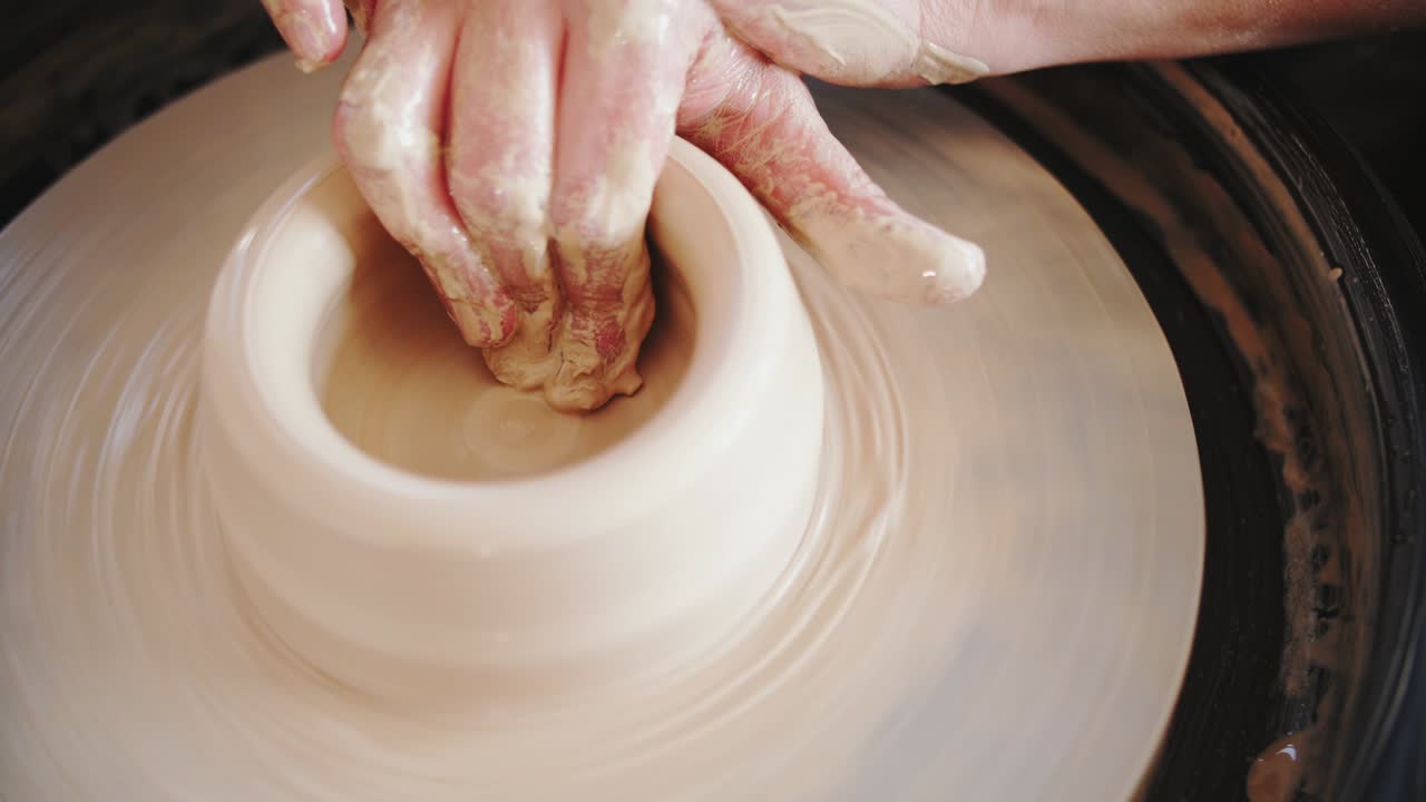footage of pottery wheel work
