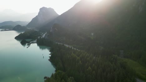 Aerial-pan-up-of-Stawamus-Chief-sunrise,-Squamish,-BC,-Canada,-Howe-Sound