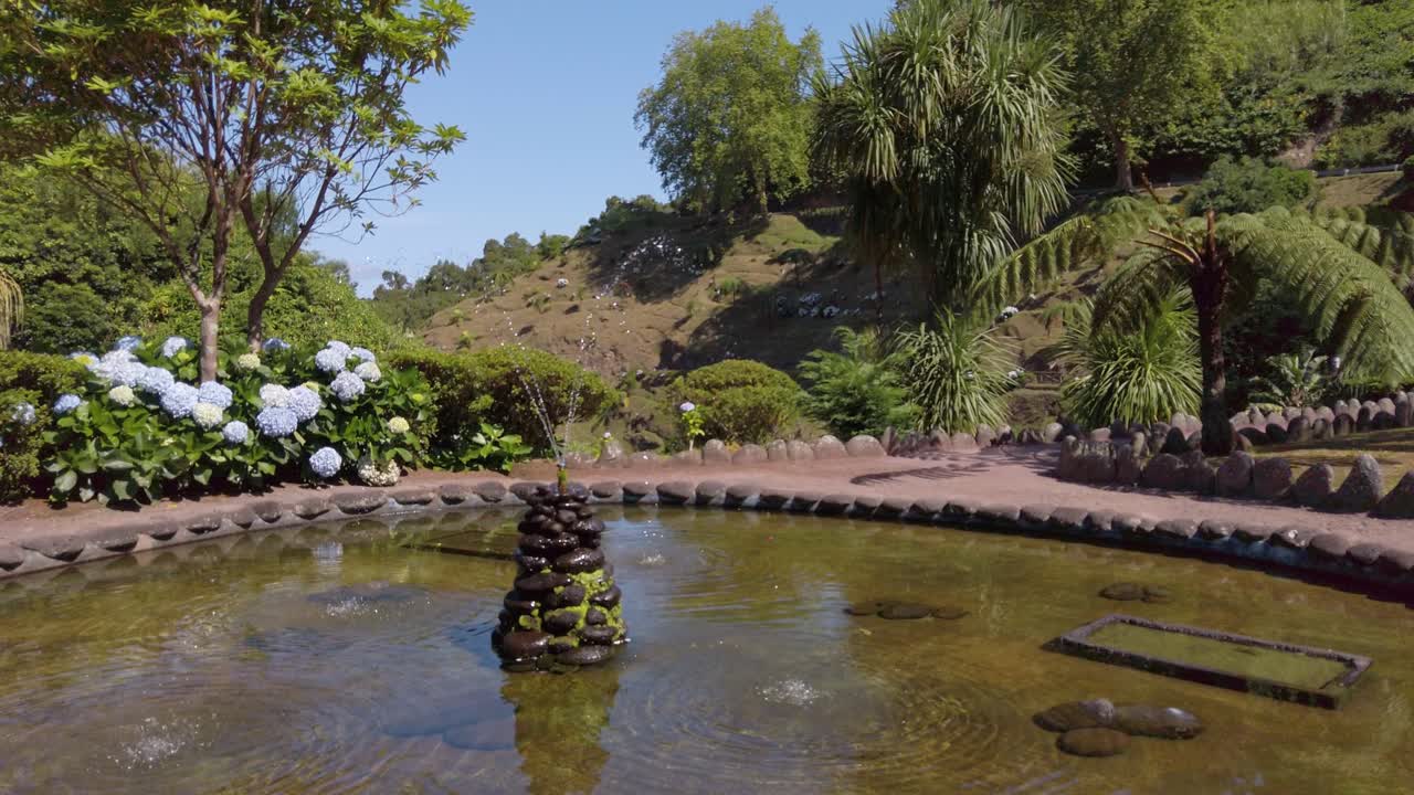 Fountain at the National Park &amp;quot;Ribeira dos Caldeiroes&amp;quot; at San Miguel Island, The Azores, Portugal - July 2023