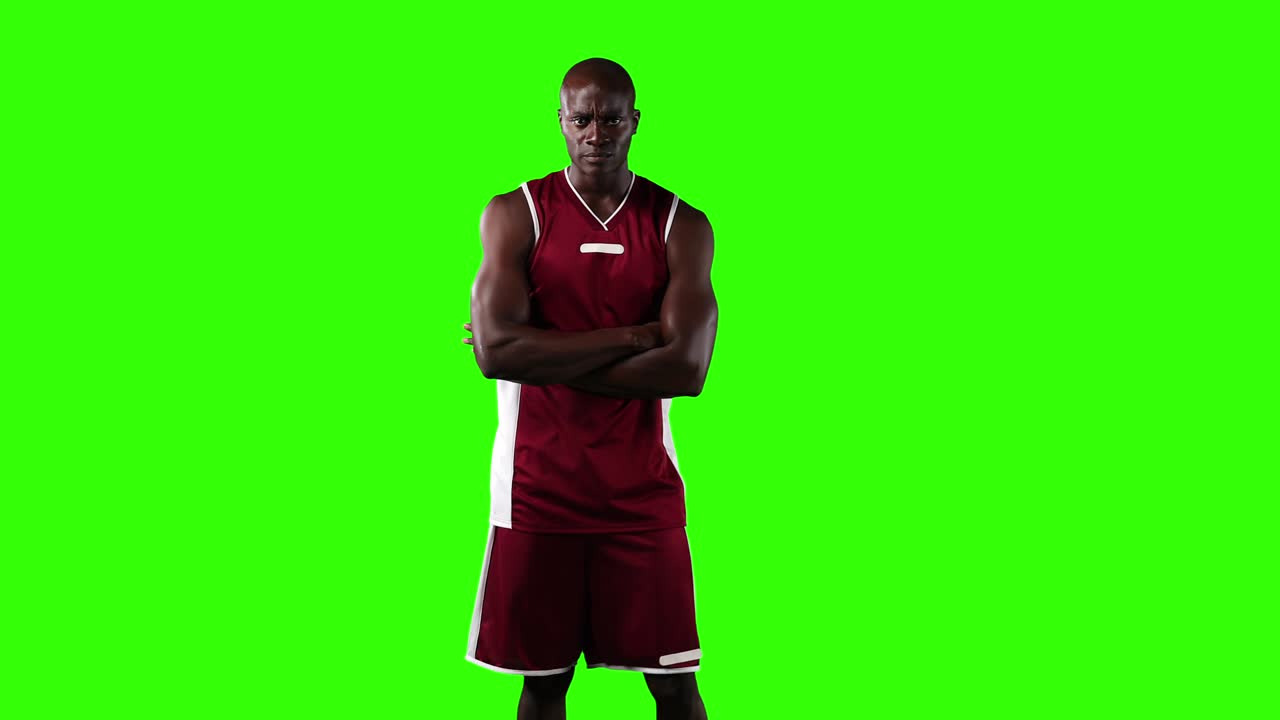 Jogador de basquete em tela verde.