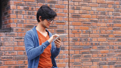 thoughtful student using tablet computer