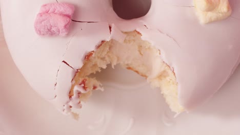 white plate on pink polka dot tablecloth
